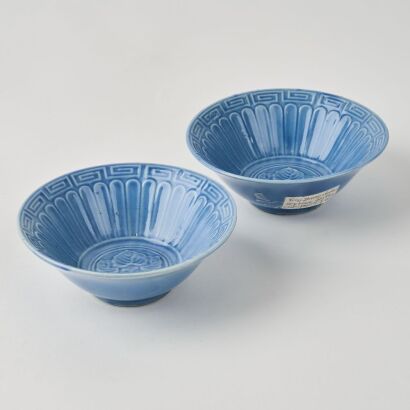 A Pair of Chinese Mid&ndash;Early 20th Century Celadon-glazed Carved Bowls