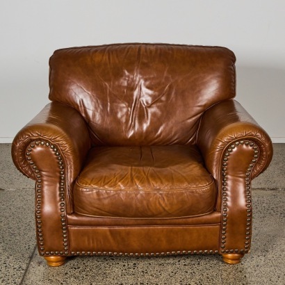 A Natuzzi Leather Chesterfield Club Chair