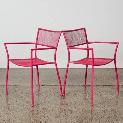 A Pair of Metal Chairs in Flamingo Pink