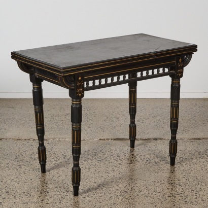 An Antique Ebonised Folding Card Table with Gilded Detail