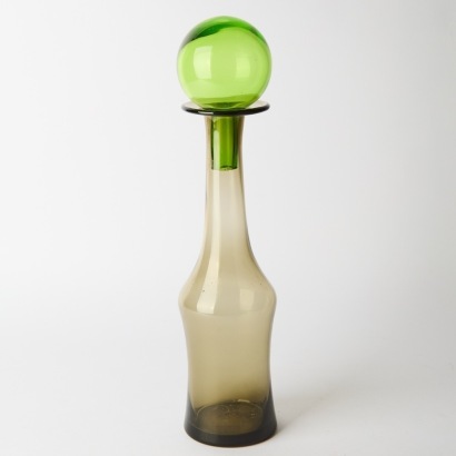 A Scandinavian Smoked Glass Bottle with Green Stopper