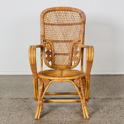 A Mid-century Cane Peacock Chair