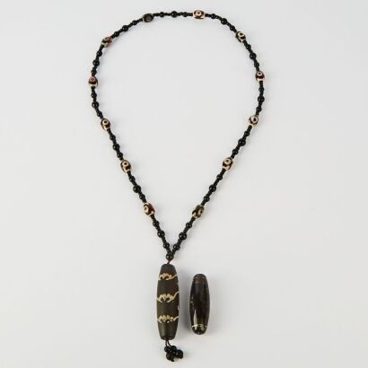 A Chinese Tibetan Dzi Bead Necklace AND A Loose Dzi Beads