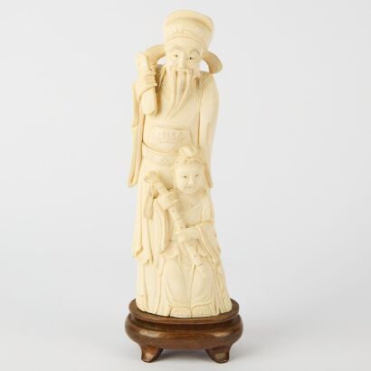 A Chinese Bone Carving of an Ancient Figure