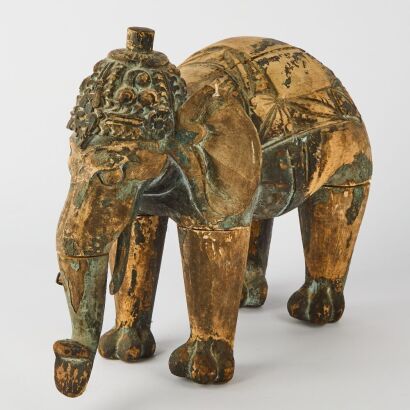 An Asian Carved Wooden Figure of an Elephant