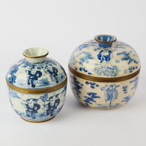 A Set of Two Chinese Blue and White Covered Figural Jars