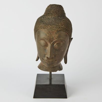 An Asian Bronze Buddha Head Ornament
