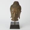 An Asian Bronze Buddha Head Ornament