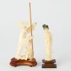 A Set of Two Chinese Bone Carved Figural Ornaments