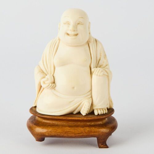 A Chinese Bone Carved Buddha Figure