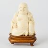 A Chinese Bone Carved Buddha Figure