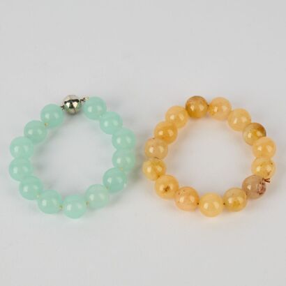 A Group of Two Chinese Jade Bead Bracelets