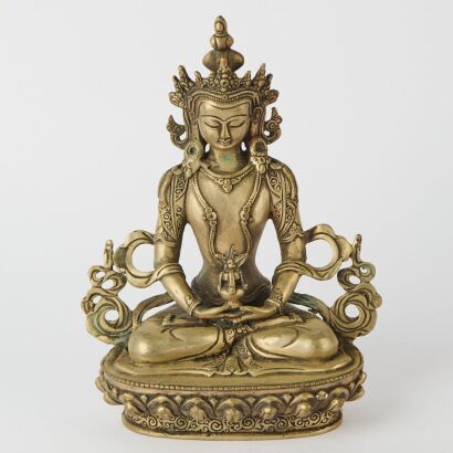 A Chinese Silver Buddhist Figure