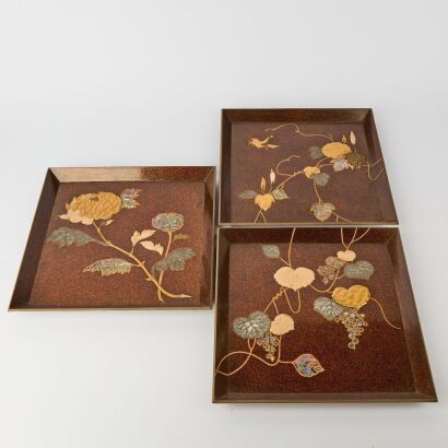 A Set of Three Japanese Mid-20th Century Gilt 'Bird and Flower' Lacquer Plates
