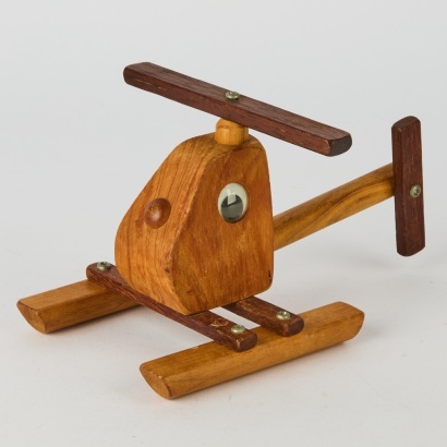 A Vintage Wood Helicopter Toy