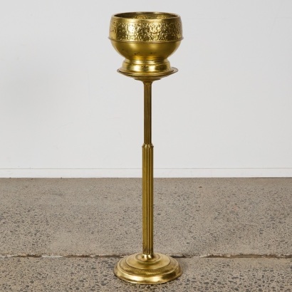 A Metal Flower Pot and Stand