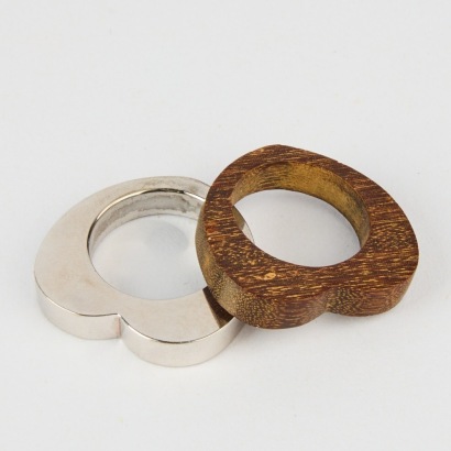 A Stainless Steel and Wood Ring Set