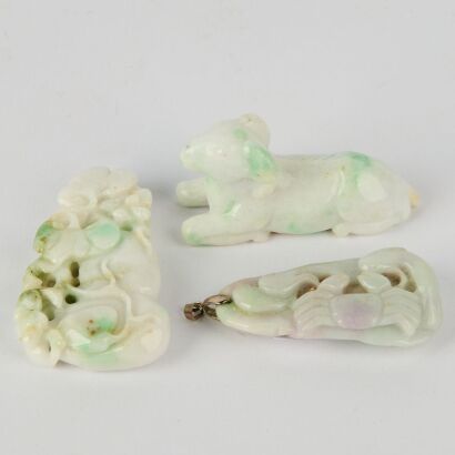 A Group of Three Chinese Jadeite Pendants