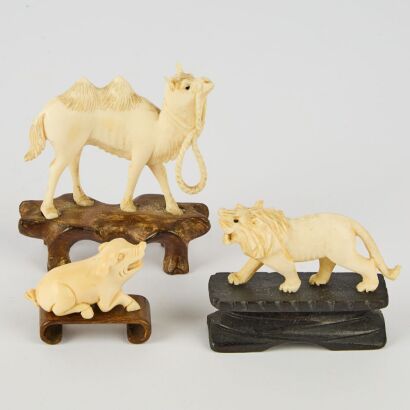 A Group of Three Chinese Bone Animal Carvings