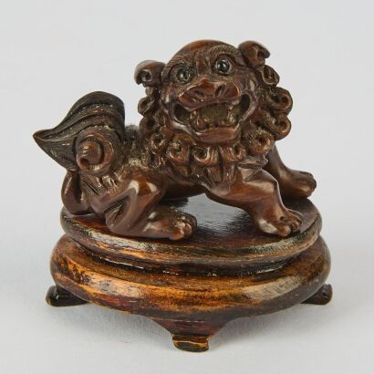 A Japanese Carved Wood Lion