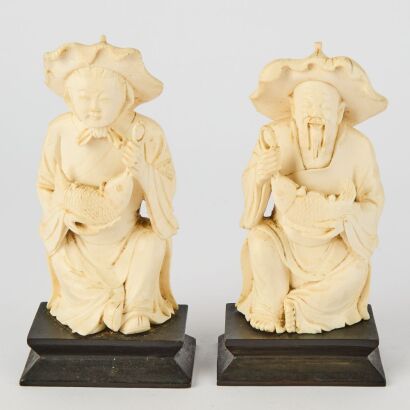 A Pair of Chinese Bone Carvings &lsquo;Nian Nian You Yu&rsquo;
