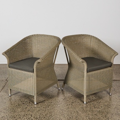 A Pair of Woven Rattan-Look Outdoor Chairs