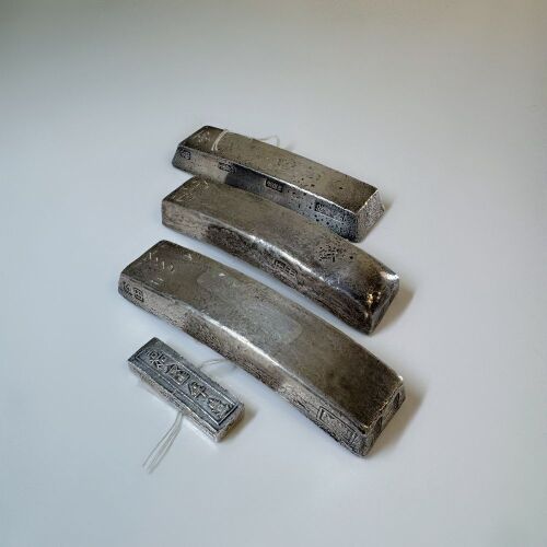 A Group of Four Chinese Silver Alloy Sycee Ingot