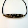 A Chinese Tibetan Nine-eyed Dzi Bead - 2