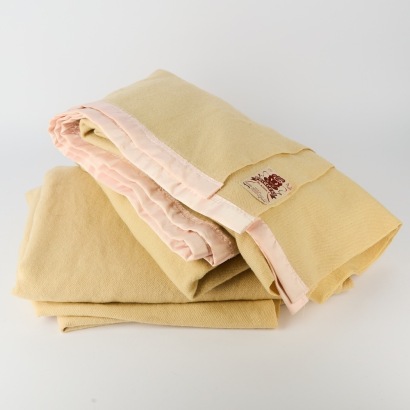 A Pair of Onehunga Cream Tiki Label Woollen Blankets