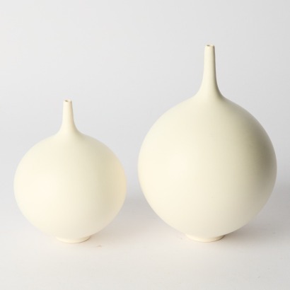 A Pair of White Peter Collis Orb Vases
