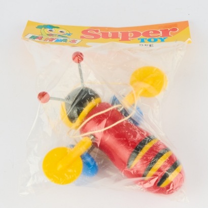 A Vintage Buzzy Bee in Original Packing, New Zealand