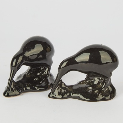 A Pair of Black Salt and Pepper Kiwi Shakers