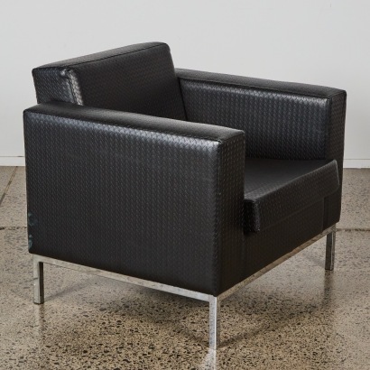 A Cubist Leather Lounge Chair With Lattice Finish