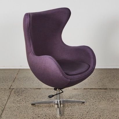 A Modern Egg Chair With Felt Upholstery