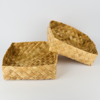 A Pair Of Woven Flax Storage Bowls