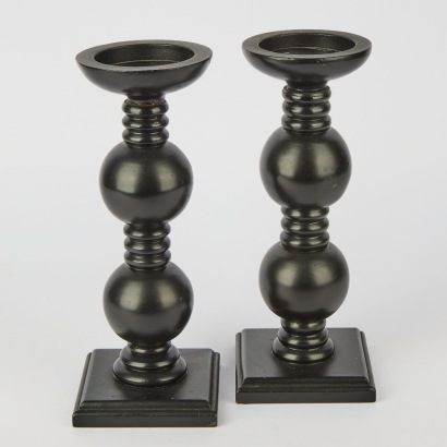 A Pair Of Black Candle holders
