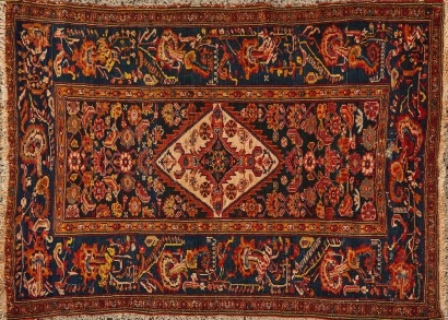 A Fine Antique Handknotted Wool Caucasian Bijov Rug in Navy, Burnt Orange