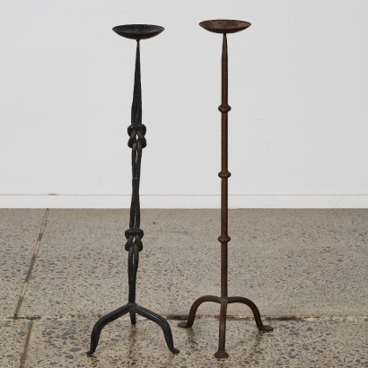 A Pair of Wrough Iron Candle Holders