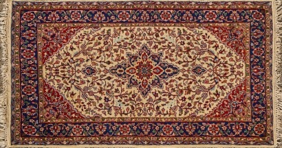 A Persian Rug in Cream, Blue and Red