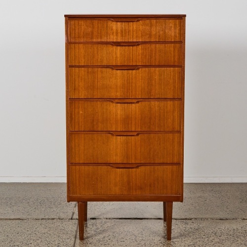 A Mid-Century Teak Set of Drawers by Austin Suite