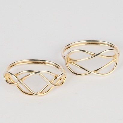 A Pair of Boxed Cristofle Celtic Knot Napkin Rings