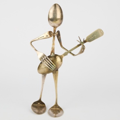 A Vintage Cutlery Guitar Player Sculpture