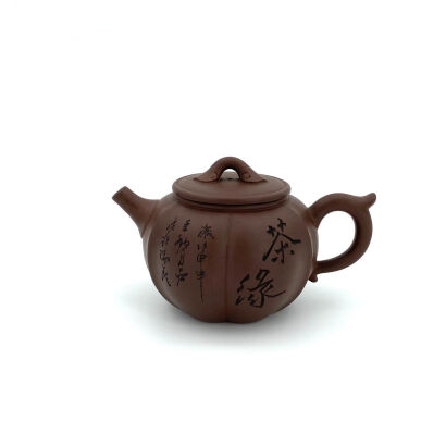 A Chinese Red Clay Melon-Shaped Ruyi-Knob Teapot