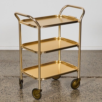 A Vintage Three-Tier Gold Drinks Trolley by Carefree, Manchester