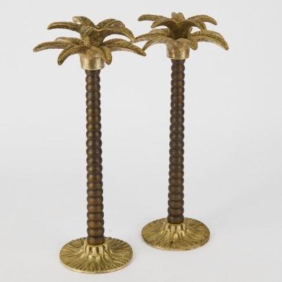 A Pair Of Cast Palm Tree Candle Holders