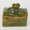 A Large George Kojis stoneware lidded box with a Koru handle