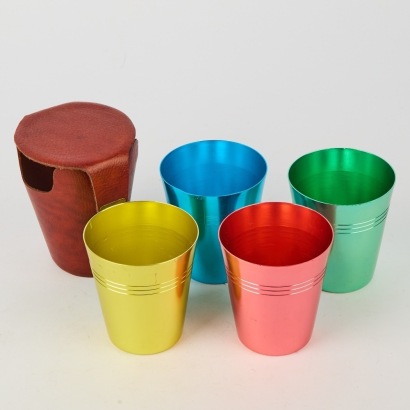 An Anodized Travel Cup Set in Leather Case