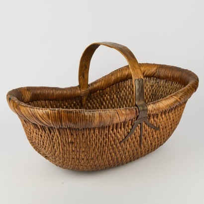 A Large Rustic Lacquered Basket with Ply Handle and Metal Detail