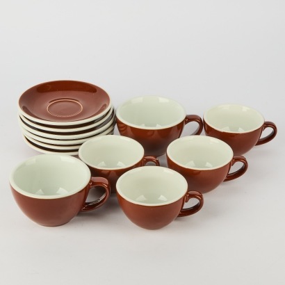 A collection of ACME Cups and saucers