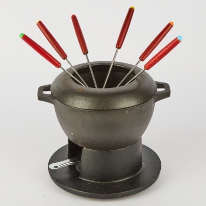 A Cast Iron Fondue Set